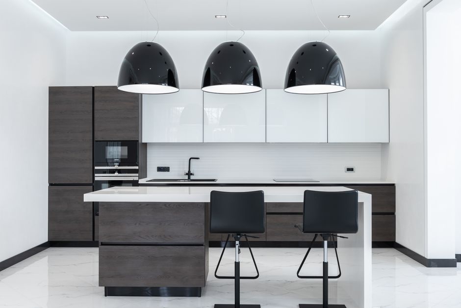 Modern kitchen interior showcasing sleek custom cabinetry